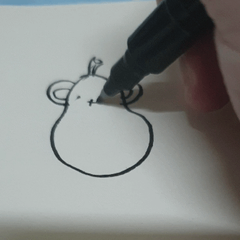 Traditional GIF of me drawing Polpebear with a pen on paper
